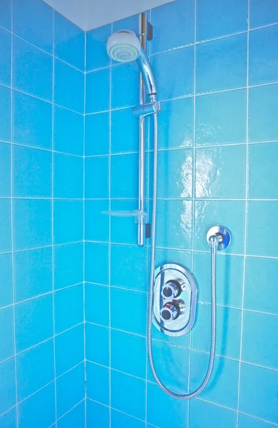 Modern bathroom with blue tiles — Stock Photo, Image