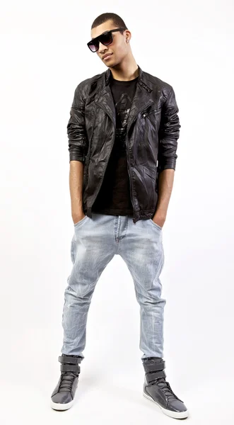 Young stylish mulatto in a leather jacket. Stock Photo