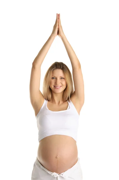 Femme enceinte pratiquant le yoga — Photo