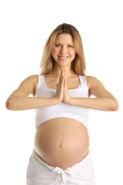 Hamile kadın yoga yapıyor. — Stok fotoğraf