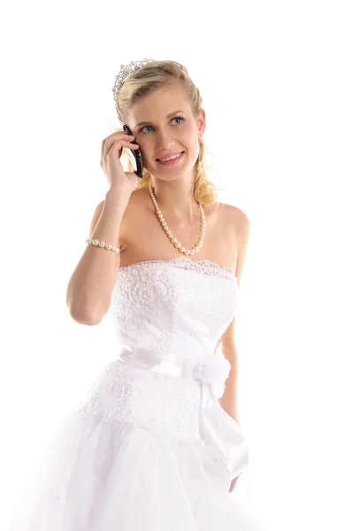 Gelukkige bruid met mobiele telefoon — Stockfoto