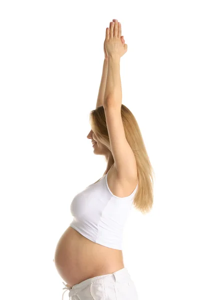 Gravid kvinna som utövar yoga — Stockfoto