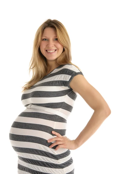 Heureuse femme enceinte en robe rayée — Photo