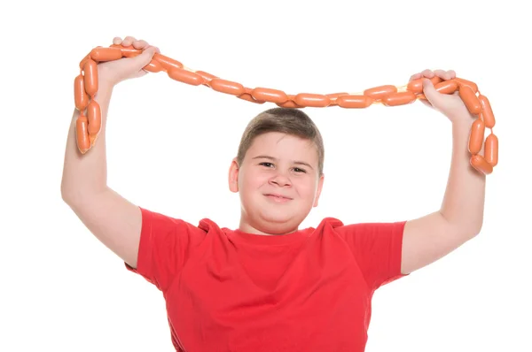 Chubby boy with sausage — Stock Photo, Image
