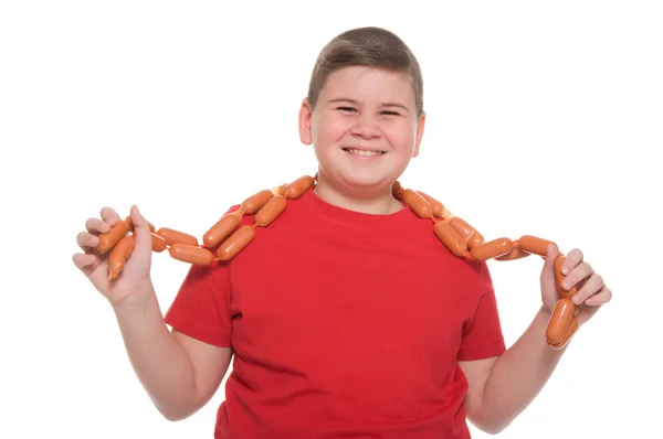 Chubby boy with sausage — Stok fotoğraf