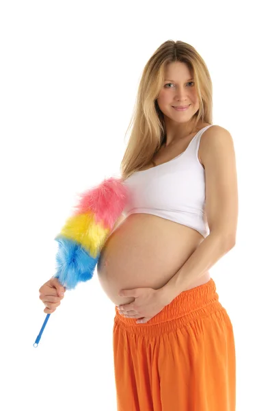Беременная женщина с кисточкой — стоковое фото