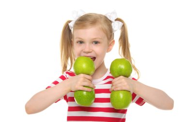 Girl bites dumbbell from apples clipart