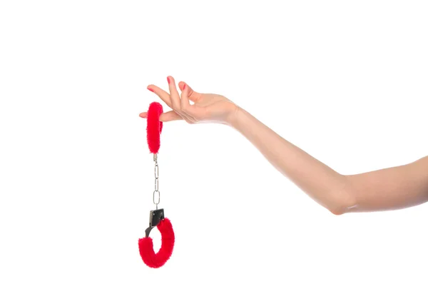Женская рука с наручниками для секс-игр — стоковое фото