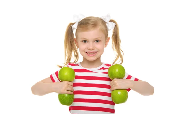 Girl trains fitness dumbbells from apples — Stock Photo, Image