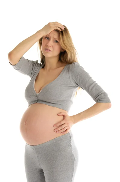 Offended pregnant woman in gray suit Stock Photo
