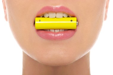 Woman holding battery in his mouth clipart