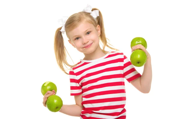 Menina treina halteres fitness de maçãs — Fotografia de Stock