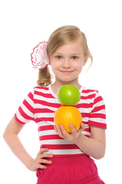 Ευτυχισμένος κορίτσι με πορτοκάλι και μήλο — Φωτογραφία Αρχείου