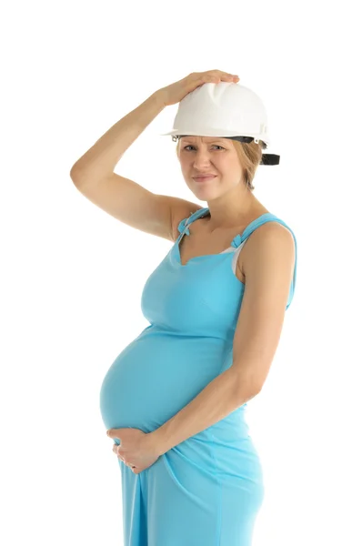 ヘルメットに挫折した妊娠中の女性 — ストック写真