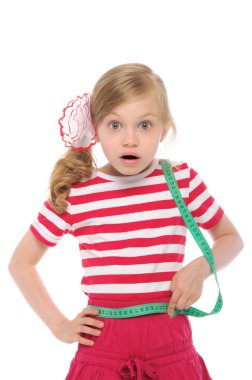 Surprised girl measuring her waist clipart