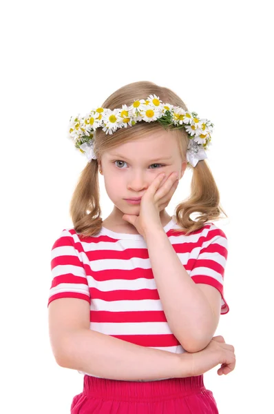 Offended girl with wreath of daisies — Stock Photo, Image