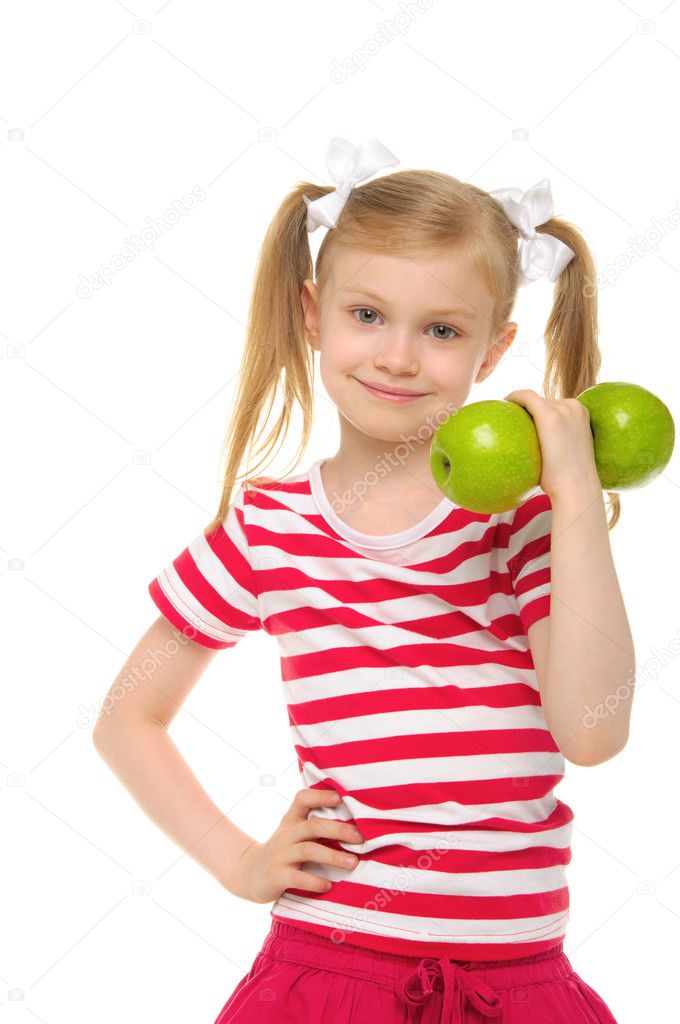 Girl trains fitness dumbbells from apples