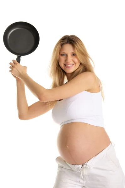 Smiling pregnant woman with frying pan — Stock Photo, Image