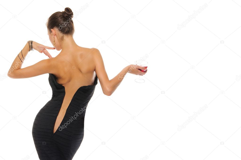 Woman with an unbuttoned dress and glass of wine