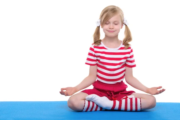 Girl with eyes closed practicing yoga — Stock Photo, Image