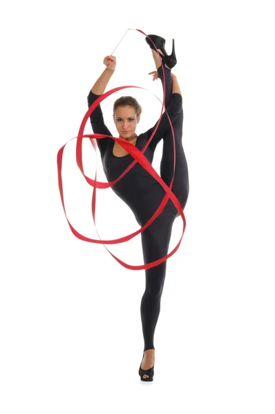Mujer joven con cinta hace cuerda vertical — Foto de Stock
