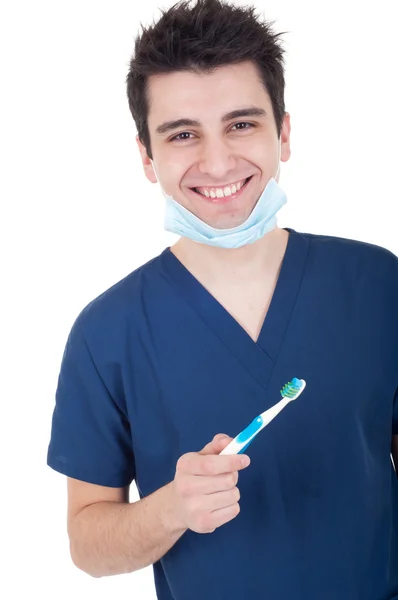 Dentiste avec brosse à dents — Photo
