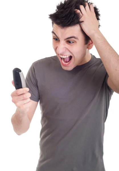 Человек кричит в мобильный телефон — стоковое фото