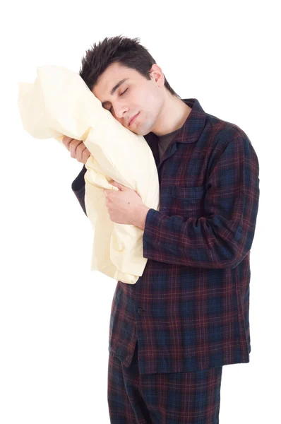 Чоловік у піжамі тримає подушку — стокове фото