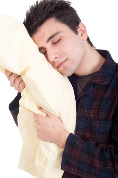 베개를 들고 잠 옷에 있는 남자 — 스톡 사진