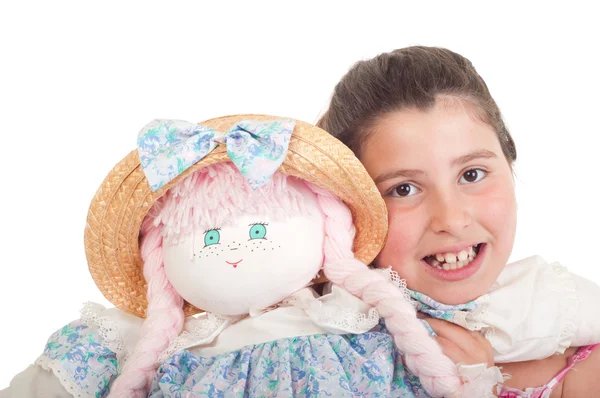 Kleines Mädchen mit Puppe — Stockfoto