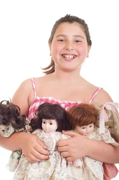 Маленькая девочка с куклами — стоковое фото