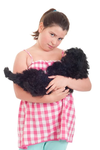 Menina segurando cão — Fotografia de Stock