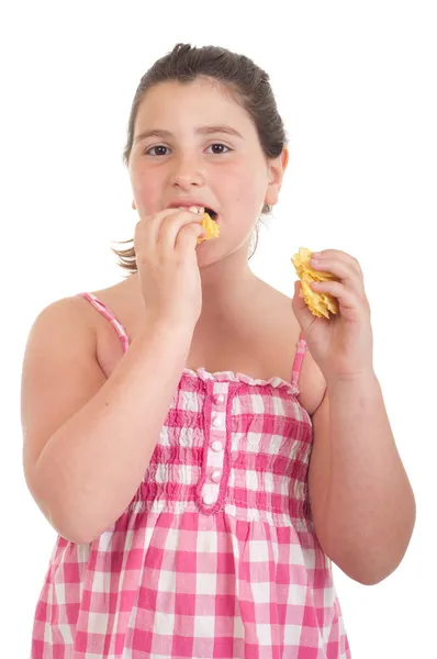 Girl eating chips — Stock Photo, Image
