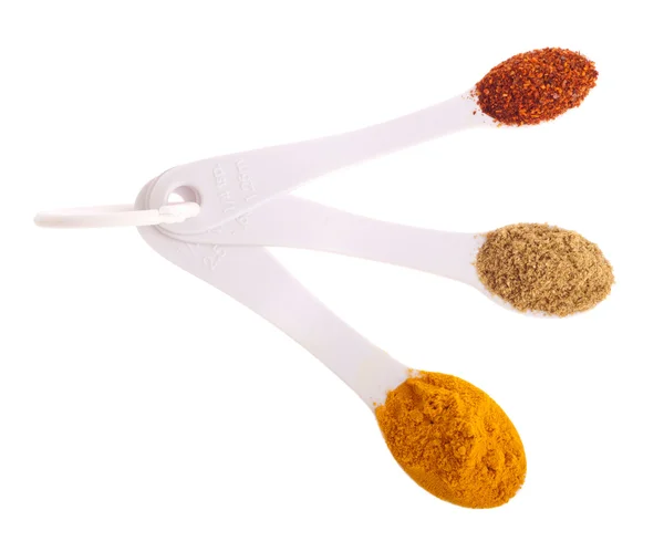 Indian spices in spoons — Stock Photo, Image