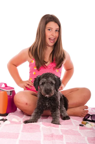 Chica en traje de baño en la playa con perro —  Fotos de Stock