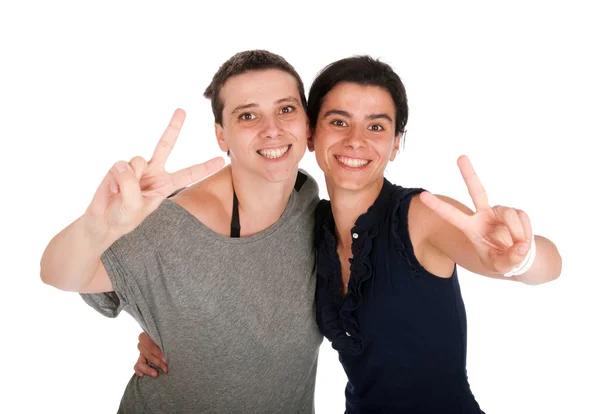 Sisters showing victory sign — Stock Photo, Image
