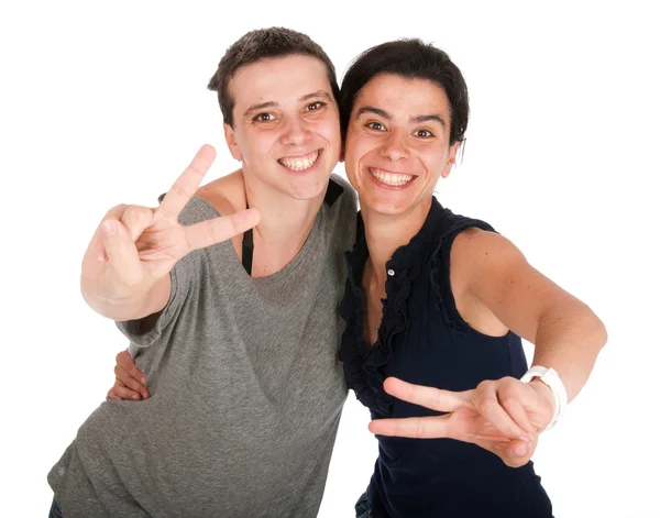 Systrar som visar tecken på seger — Stockfoto