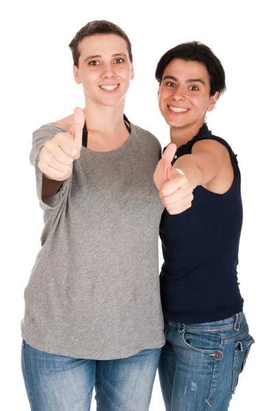 Irmãs mostrando polegares para cima — Fotografia de Stock
