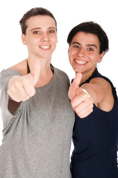 Irmãs mostrando polegares para cima — Fotografia de Stock