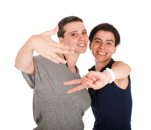 Sisters showing victory sign — Stock Photo, Image