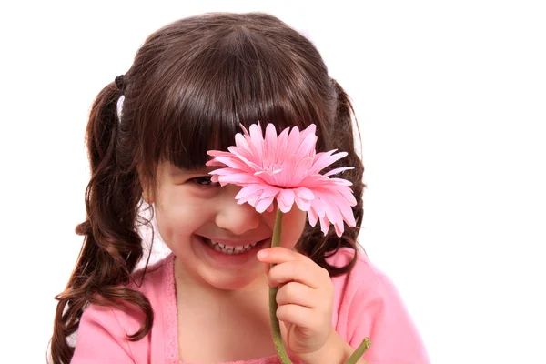 Cute little four year old girl with daisy — Stock Photo, Image