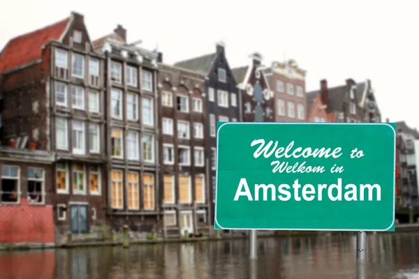 Witamy w Amsterdamie znak w wodzie — Zdjęcie stockowe