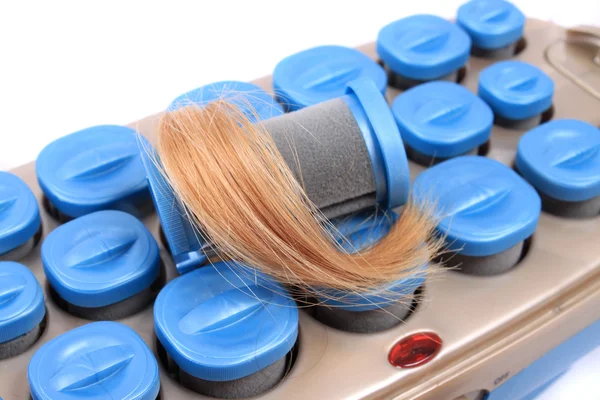 Rulli caldi con capelli biondi — Foto Stock