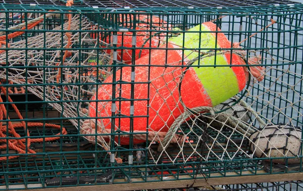Lobster traps and colorful buoys — Stock Photo, Image