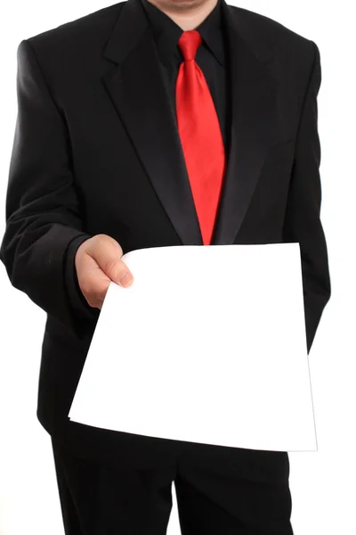 Businessman offering blank document — Stock Photo, Image