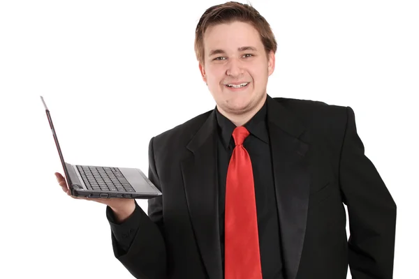 Man with netbook smiling — Stock Photo, Image
