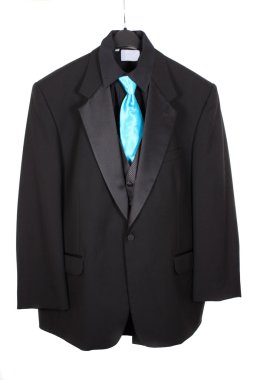 Closeup of three piece suit with blue tie clipart