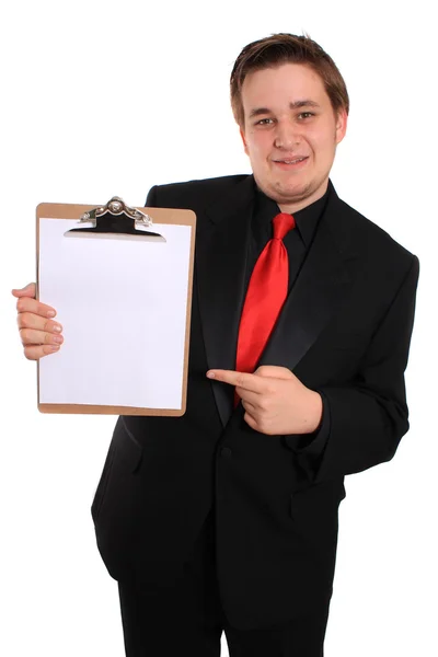 Hombre sujetando portapapeles con página en blanco —  Fotos de Stock