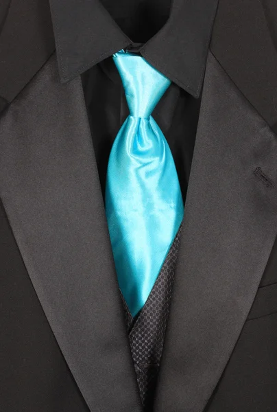 Closeup of three piece suit with blue tie — Stock Photo, Image