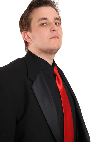 Молодий бізнесмен в чорному формальному костюмі — стокове фото